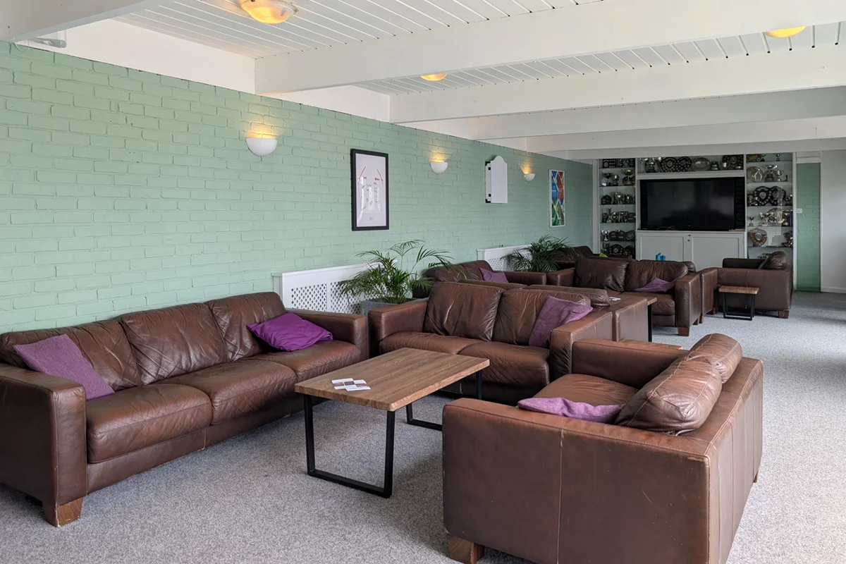 facilities-bar-cafe-lounge-area-01 Sofas in the lounge area at the club.